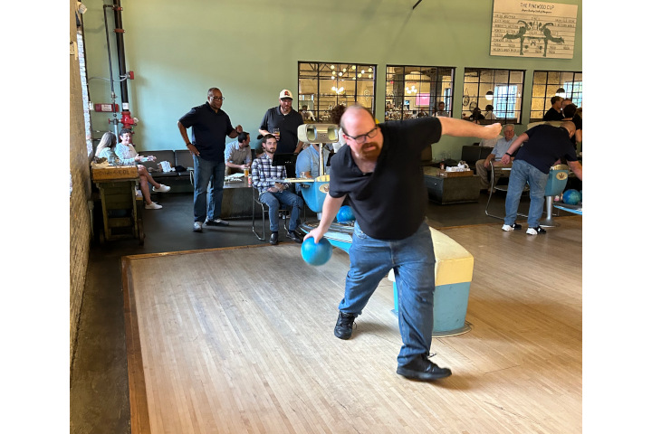 Veteran attendee Tom takes on the pins at Pinewood Social